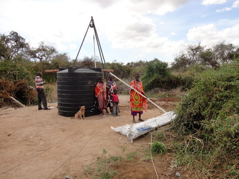 The Maasai women help out.